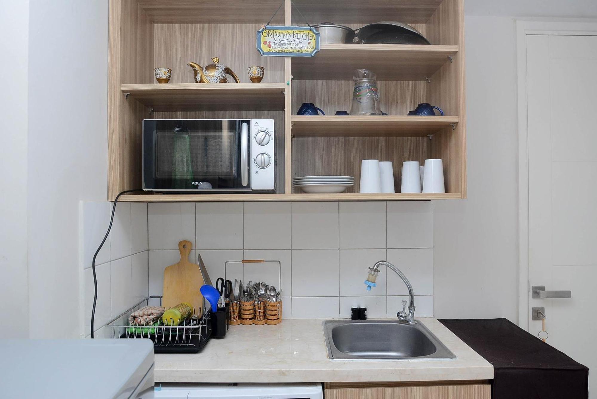 Modern 2br Springlake Summarecon By Travelio *